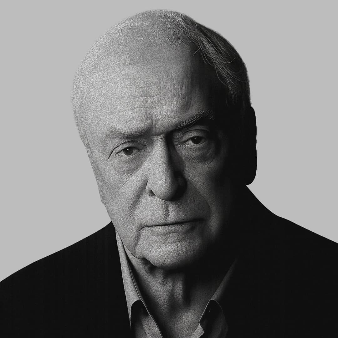 Michael Caine in black and white looking at the camera