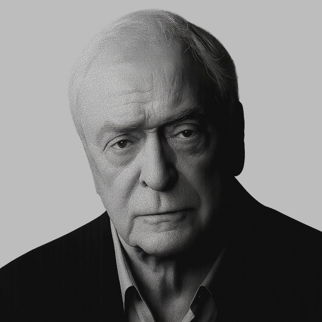 Michael Caine in black and white looking at the camera
