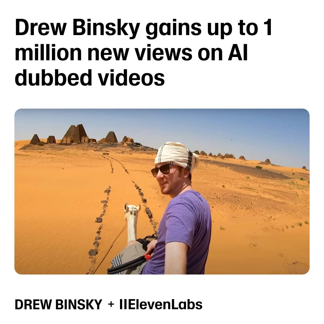A man riding a camel in a desert with ancient ruins in the background.