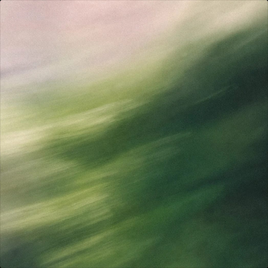 Soft-focus green abstract waves