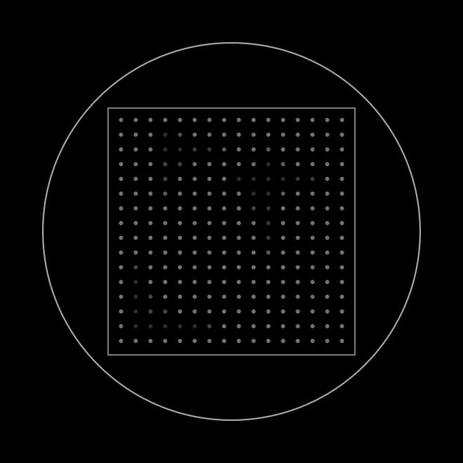 Black square with a grid of small dots inside a larger circle on a green background.