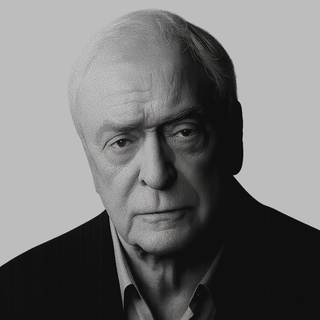 Michael Caine in black and white looking at the camera