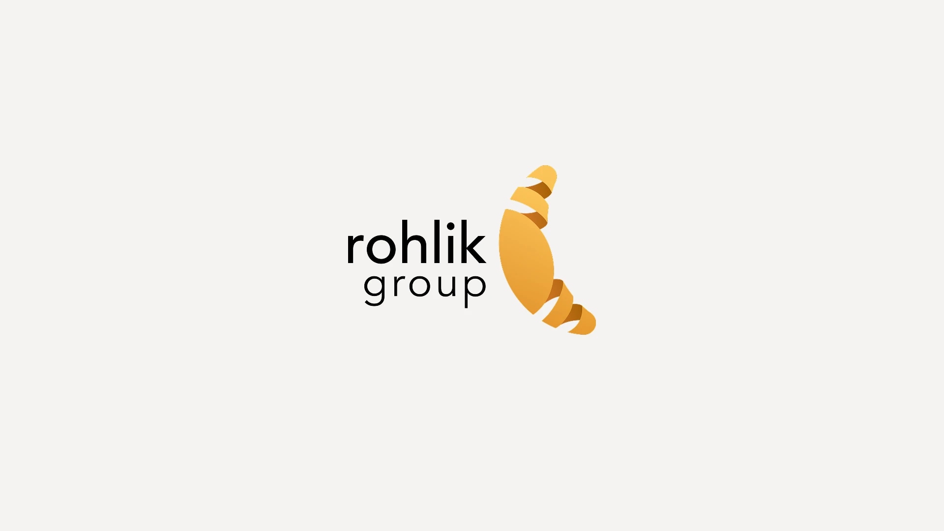 Rohlik Group logo with stylized croissant design.