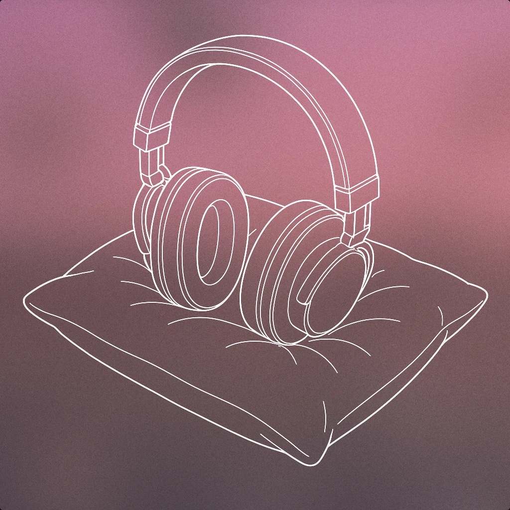 Cover of a pair of closed over-ear headphones resting on a soft pillow for Sleep sound effects