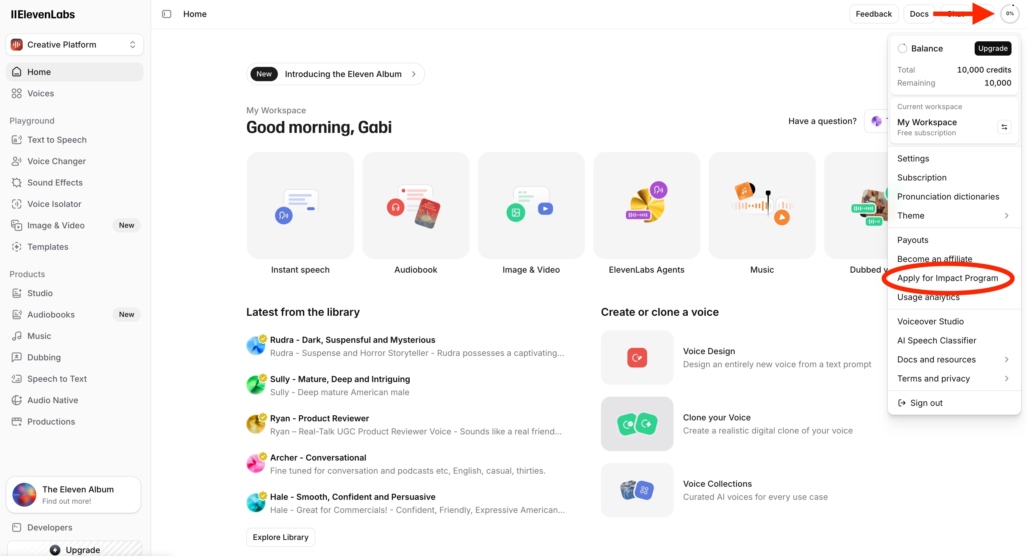 Screenshot of the ElevenLabs homepage, with an arrow pointing to your profile button, and circling the button that says "Apply for Impact Program"