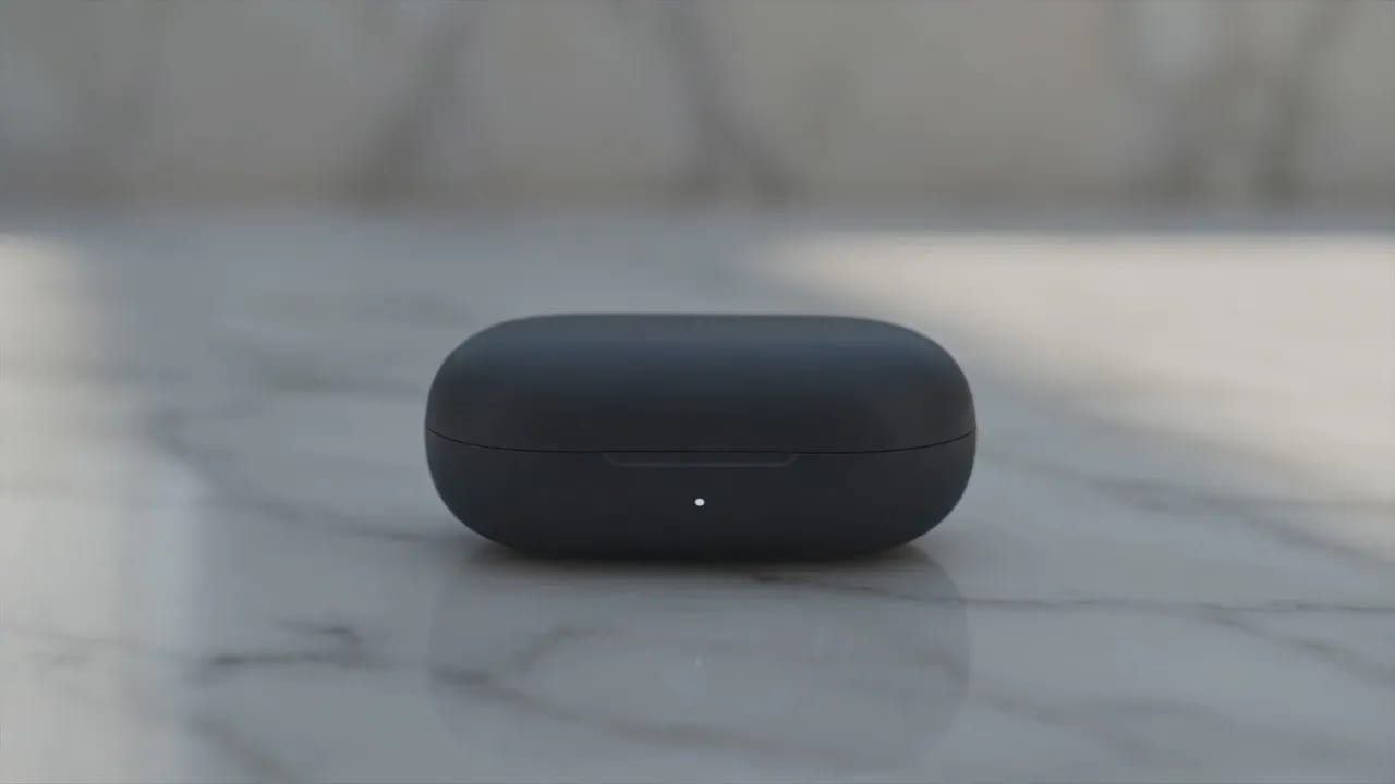 30-second advertising spot for premium matte-black wireless earbuds. Narrative arc: opening (0-5s) close-up of a charging case snapping open on a white marble surface, soft morning light through a window; progression (5-15s) a woman in her 30s with a dark ponytail and grey athletic wear puts them in and starts jogging through a rainy city street at dawn, camera tracking alongside; turning point (15-23s) she stops at a crosswalk, the world's noise visually fades, slow-motion rain droplets suspended around her, calm expression; conclusion (23-30s) product hero shot on dark background with dramatic rim lighting and empty space for a logo. Continuous camera transitions between scenes, no hard cuts, cinematic color grading, consistent character throughout.