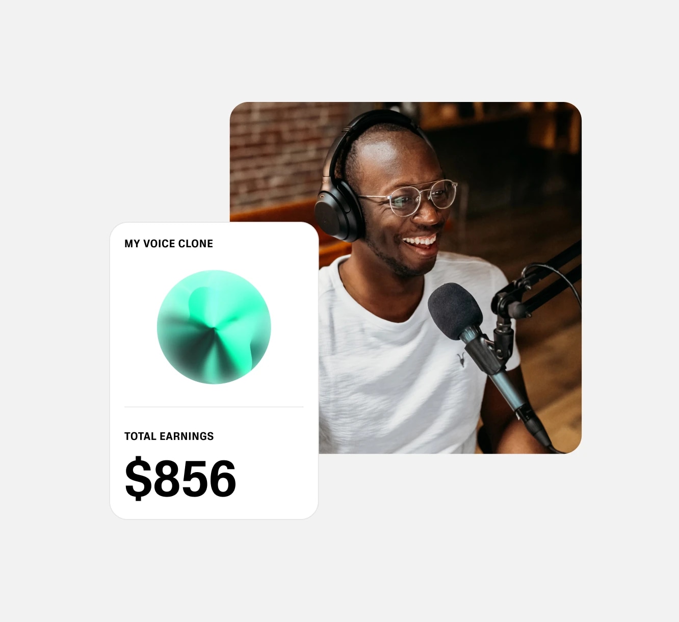 A man wearing glasses and headphones, speaking into a microphone, smiling during a recording session.