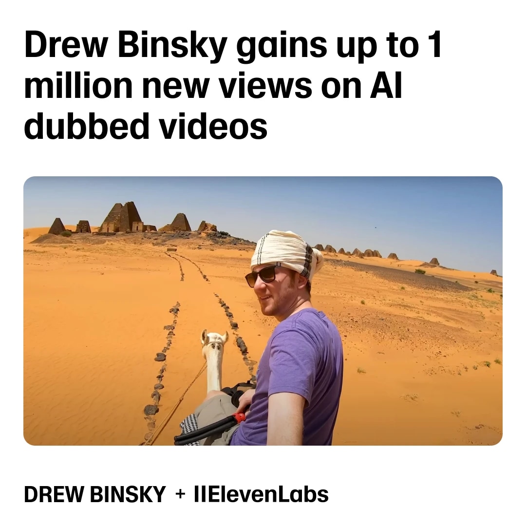 A man riding a camel in a desert with ancient ruins in the background.